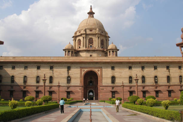 Delhi citizens are walking the path to the Secretariat Building. The Secretariat Building or Central Secretariat is where the Government of India is housed. It is home to some of the most important ministries of the Cabinet of India.